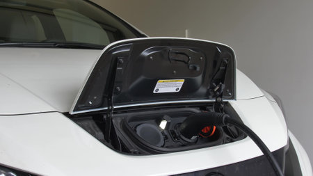 Charging Electric Car With Type 2 Charging Plug Interface Close-Upの写真素材