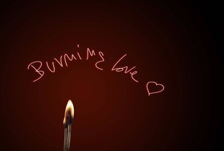 Burning love, a couple of matches burning of love.の写真素材