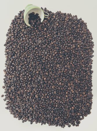 Green cup of coffee beans.の写真素材