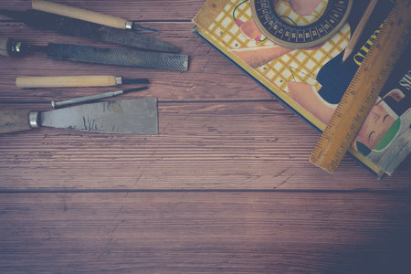 Handymans vintage tools on wood background. Close up.の写真素材