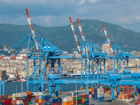 Genoa, Italy - 06 06 2021: Panoramic view of the container port and ferry terminal in Genoa, Italy.の写真素材