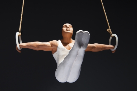 figure of a gymnast on the rings