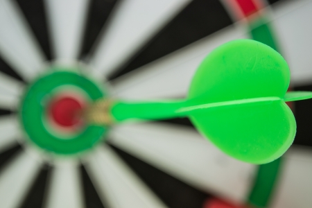 dart hitting a targetの写真素材