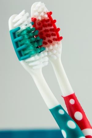 colorful toothbrushes isolated on white backgroundの写真素材