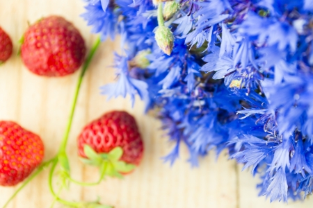 cornflowers with strawberriesの写真素材