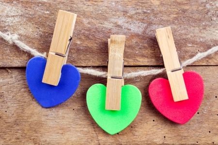  Colored hearts on wooden backgroundの写真素材