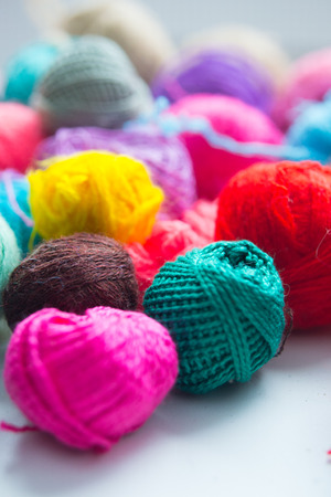 Balls of yarn on white backgroundの写真素材