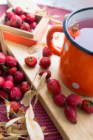 Rosehip tea tea on wooden tableの写真素材