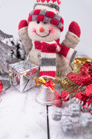 Christmas Decorations with snowman,gift and christmas baublesの写真素材