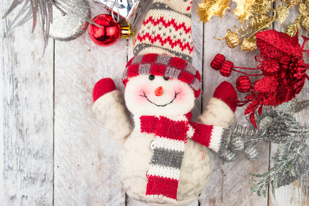 Christmas Decorations with snowman,gift and christmas baublesの写真素材