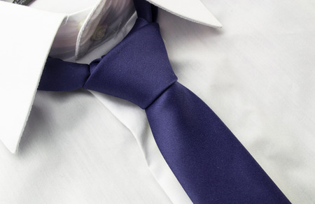 Detail view of business shirt with tieの写真素材