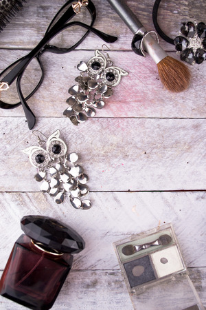 Feminine cosmetic background. Overhead of essentials of a modern woman.の写真素材