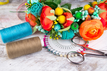 Turquoise hoop from flowers, Hair accessories. Decoration for the head on white woodの写真素材