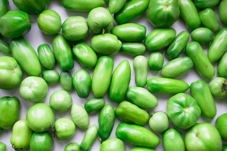 Pickle green tomatoes background closeupの写真素材