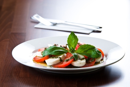 mozarella salad with pesto sauce and tomatoes