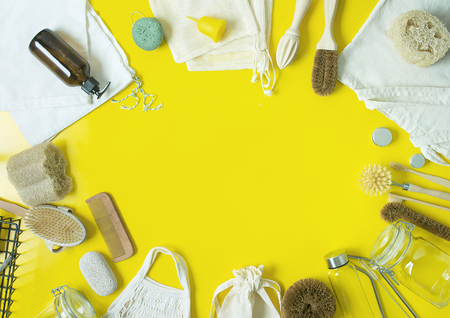 zero waste lifestyle kit on yellow background with copy spaceの写真素材