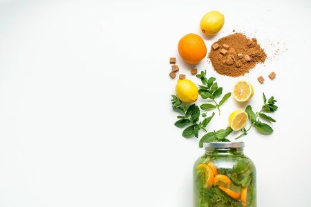 ingredients for home made lemonade on white background. flat lay with copy spaceの写真素材