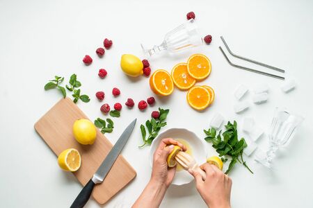 ingredients for home made lemonade on white background. flat lay with copy spaceの写真素材
