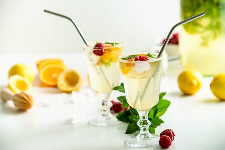 ingredients for home made lemonade on white background. flat lay with copy spaceの写真素材