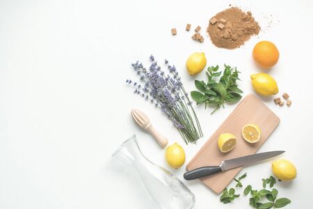 ingredients for home made lemonade on white background. flat lay with copy spaceの写真素材