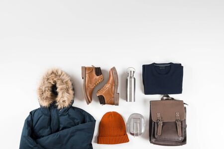 winter men's base wardrobe on white background with copy spaceの写真素材