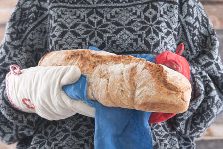 woman carry fresh hot bread