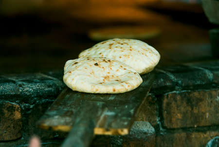 . Preparation of tradition arabic breadの写真素材