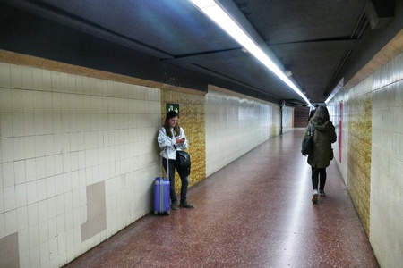 Barcelona Spain metro station tunnel with alone girl standingのeditorial素材