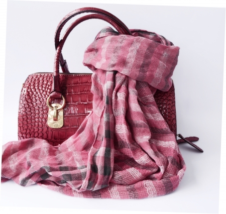 pink bag made of genuine leather and checkered scarfの写真素材