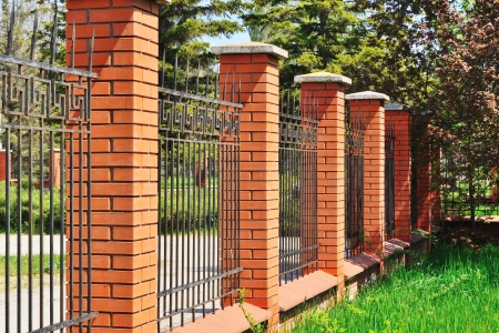 fence of stone and metalの写真素材