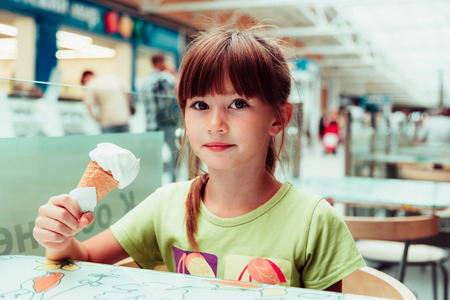 little girl, very cheerful girl in summerの写真素材