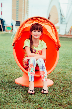 little girl, very cheerful girl in summerの写真素材
