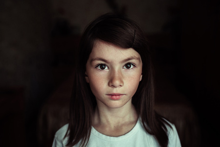 child portrait, expressive eyes of a little girlの写真素材