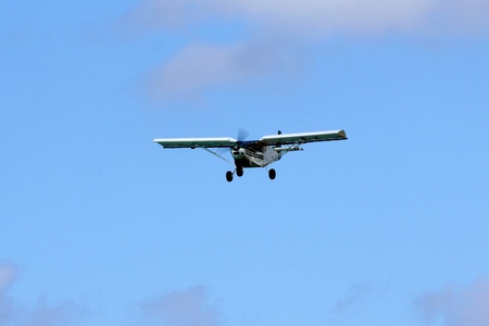 Old airplane  in the blue sky