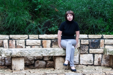 beautiful woman posing in the parkの写真素材