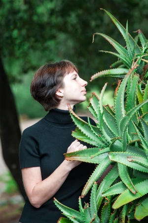 beautiful woman posing in the parkの写真素材