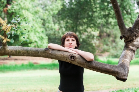 beautiful woman posing in the parkの写真素材