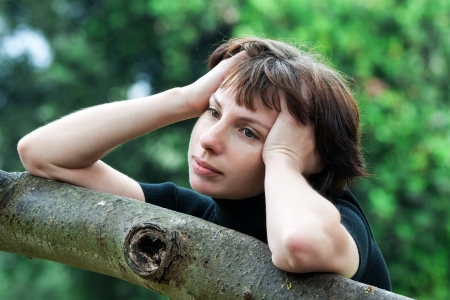 beautiful woman posing in the parkの写真素材
