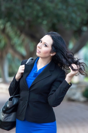 beautiful woman posing in the parkの写真素材