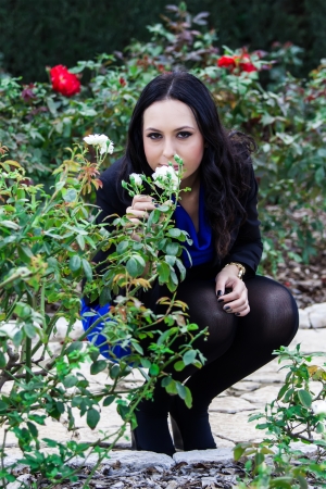 young woman smelling a roseの写真素材