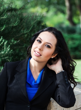 beautiful woman posing in the parkの写真素材