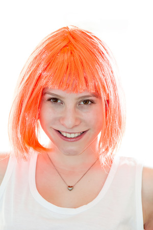 Happy pretty girl with orange hairの写真素材