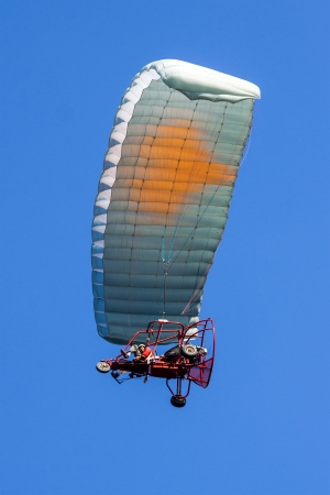 Moto paraglider on the skyの写真素材