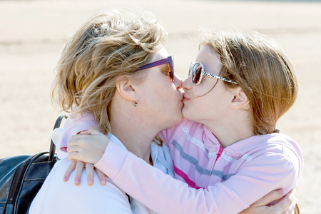 A little girl and her mother togetherの写真素材
