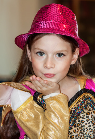 emotional young girl in red hatの写真素材