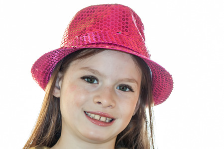 emotional young girl in red hatの写真素材