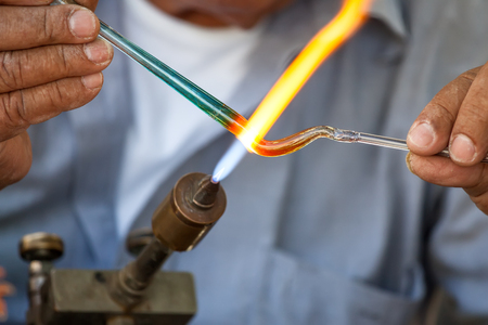 Artist works on glassの写真素材