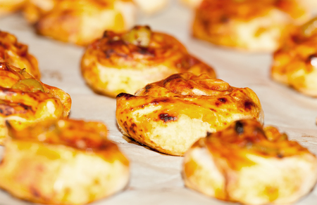 Homemade baked small bread with cheese and cinnamonの写真素材