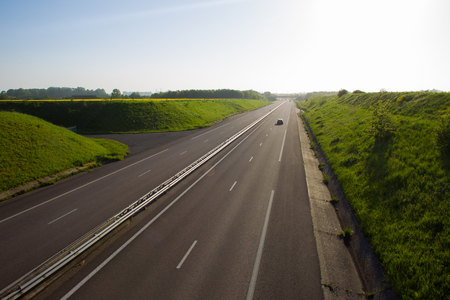 Highway in Normandy . Springtime Sunset . Travel in Franceの写真素材