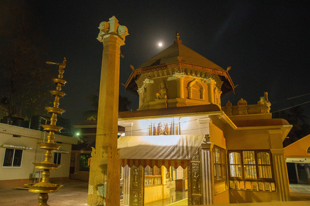 Hinduism Temple at evening. Yellow color. In Gokarna district, India. Moonの写真素材